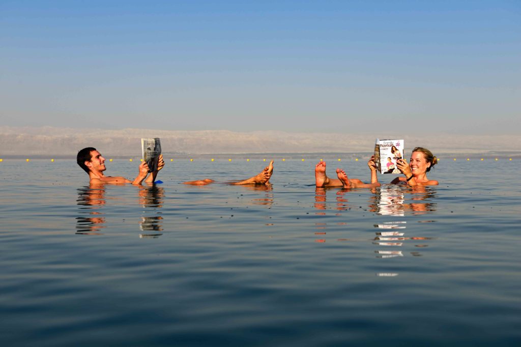 Tourists bath in Dead Sea, Jordan, Middle East, Orient- Model Released –